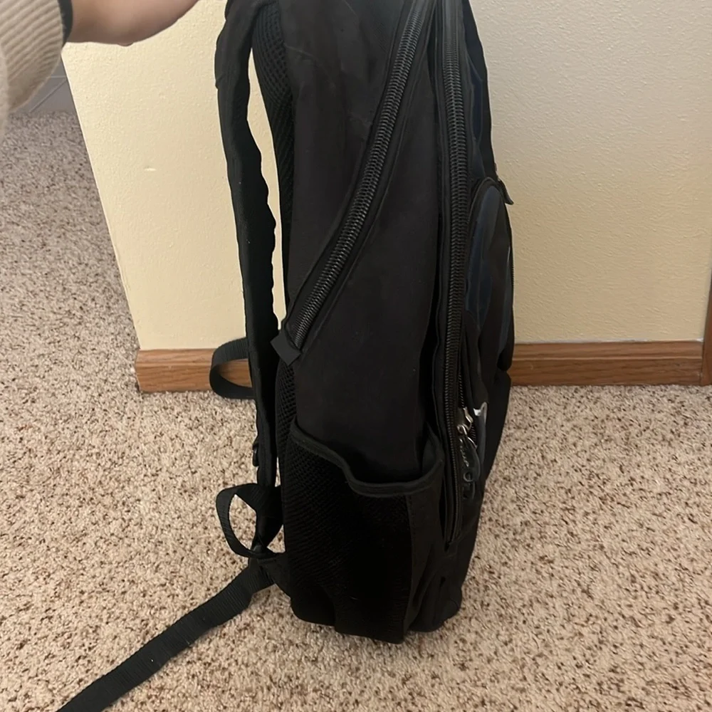 foray black and blue reflective laptop school backpack with many pockets